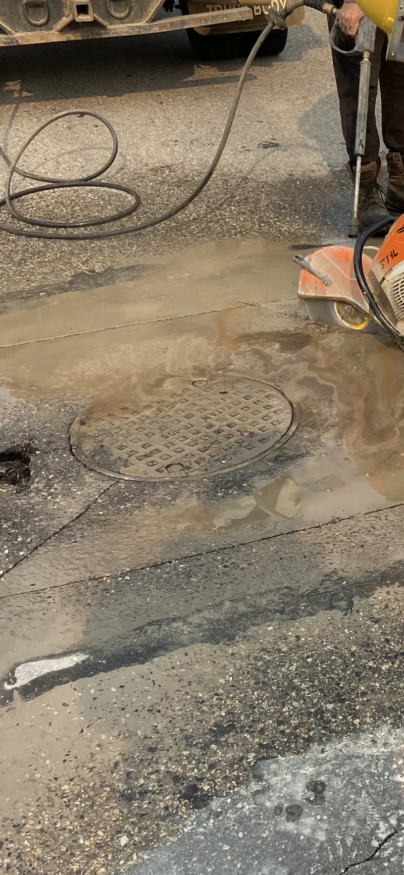 Hydrant removed beside an exposed valve box